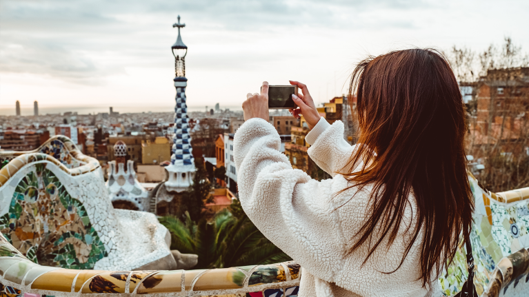 spain-barcelona-girl-taking-picture-of-panorama-winter
