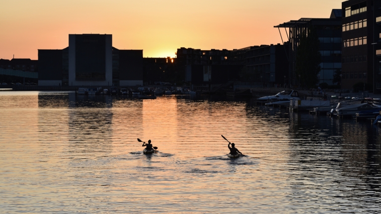 copenhagen-denmark-canoe-sunset-city