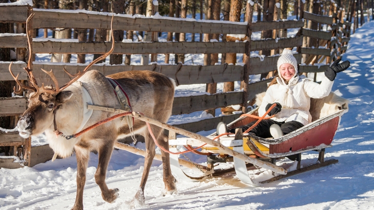 finland-lapland-reindeer-sleigh-winter-snow-woman